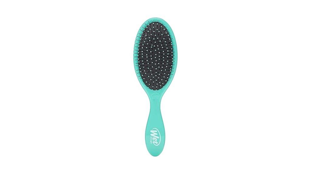 aqua colored detangling brush