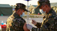 US military requires flu vaccine for some after outbreak in Texas training center