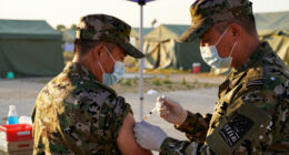 US military requires flu vaccine for some after outbreak in Texas training center